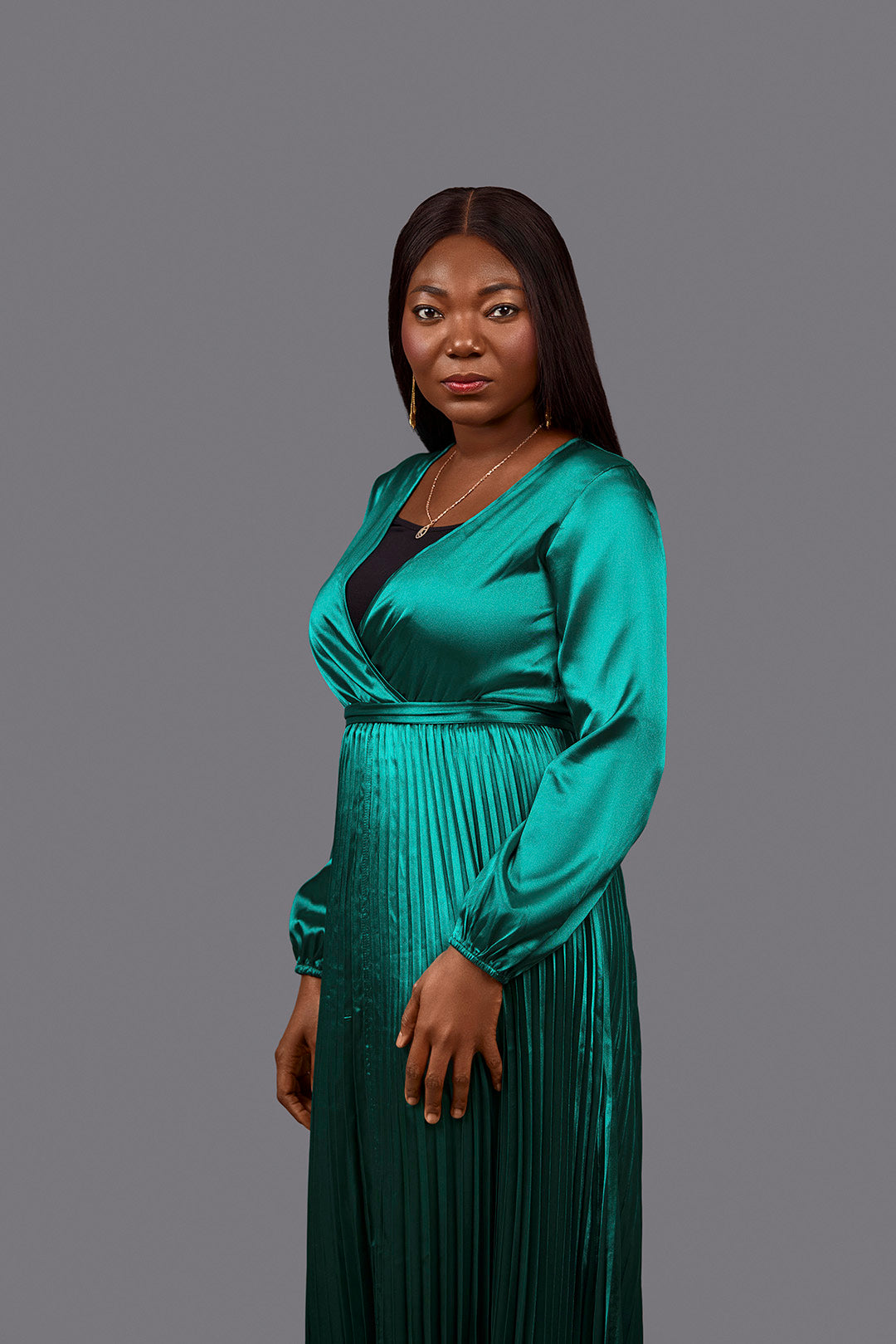 Emerald Radiance Pleated Gown